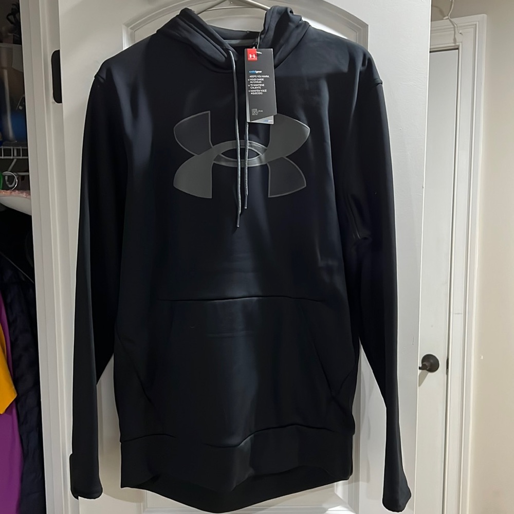 Men’s Under Armour size medium hoodie, new with tags. Black with gray logo.